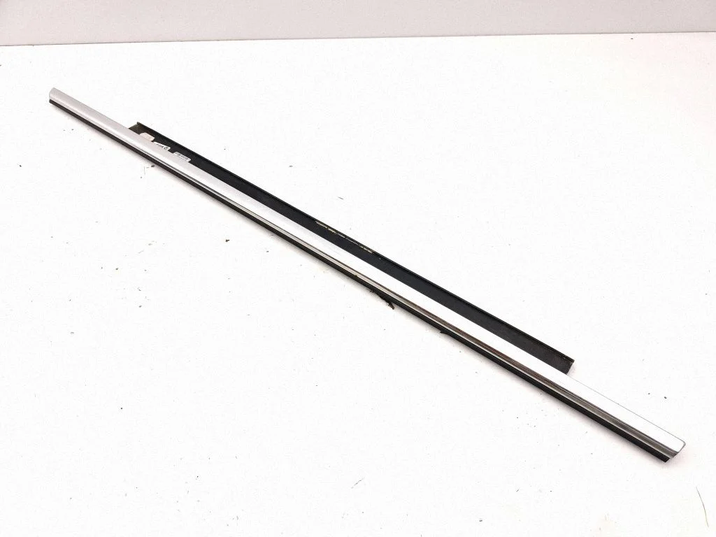 Rear door glass trim molding – left