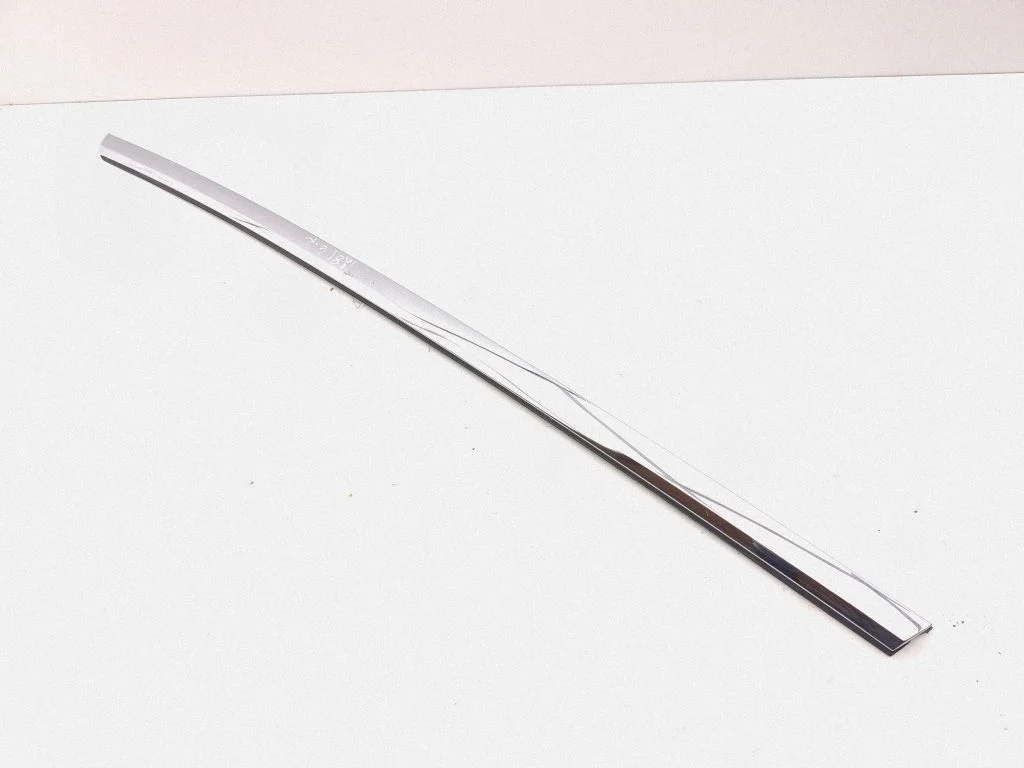 Rear door glass trim molding – left