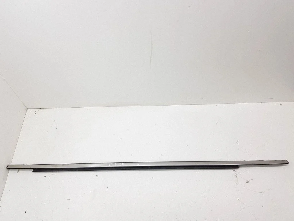 Rear door glass trim molding – left