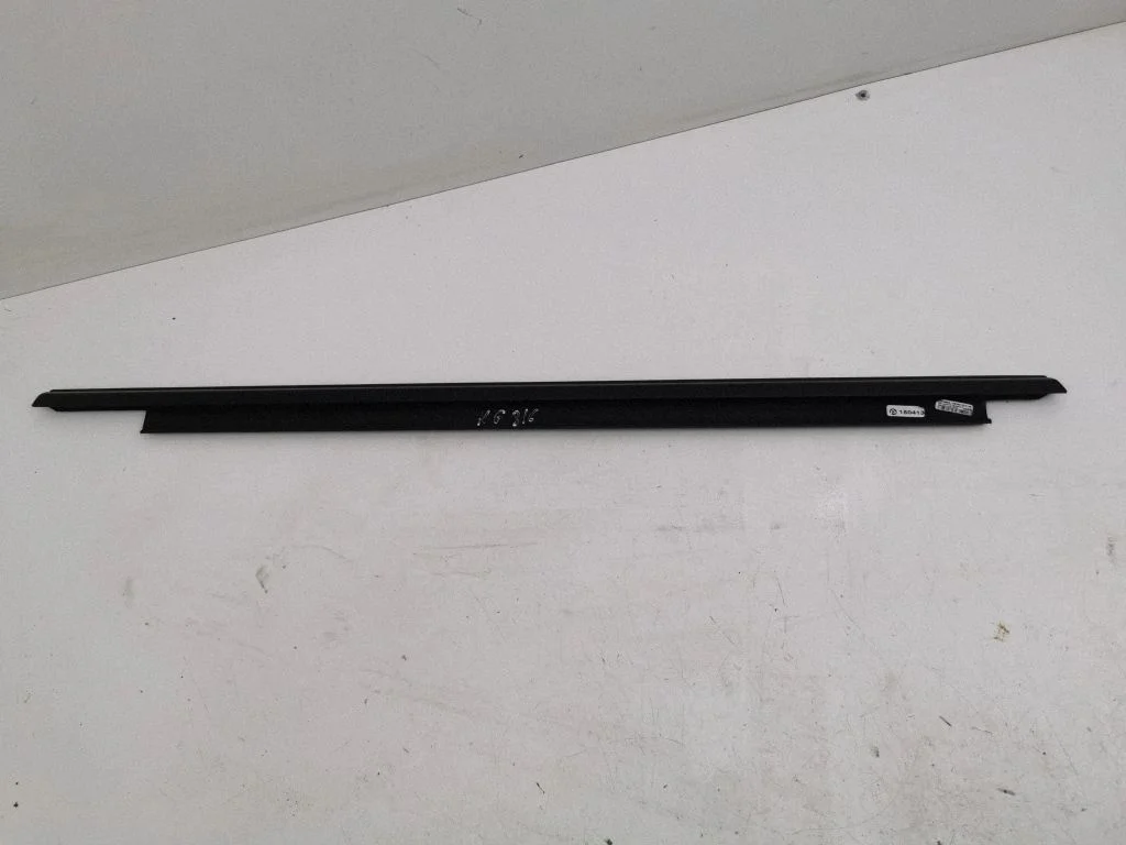 Rear door glass trim molding – left