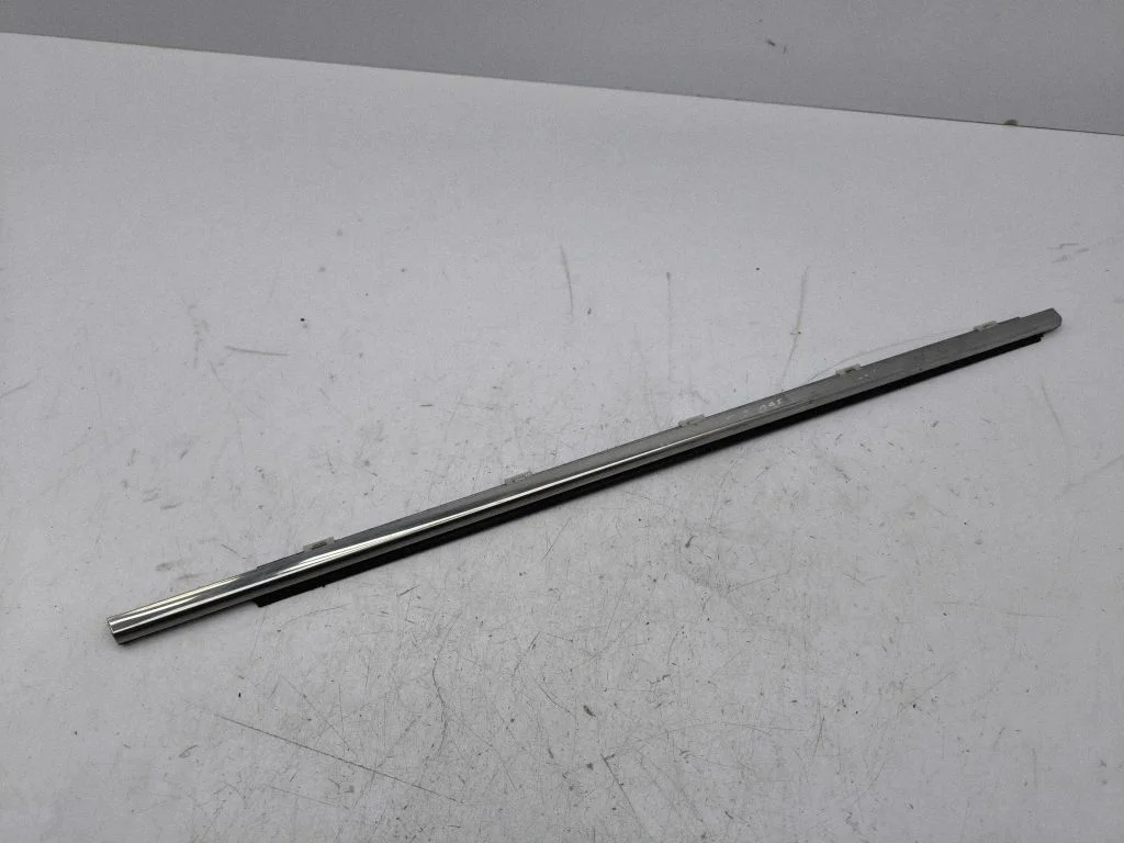 Rear door glass trim molding – left