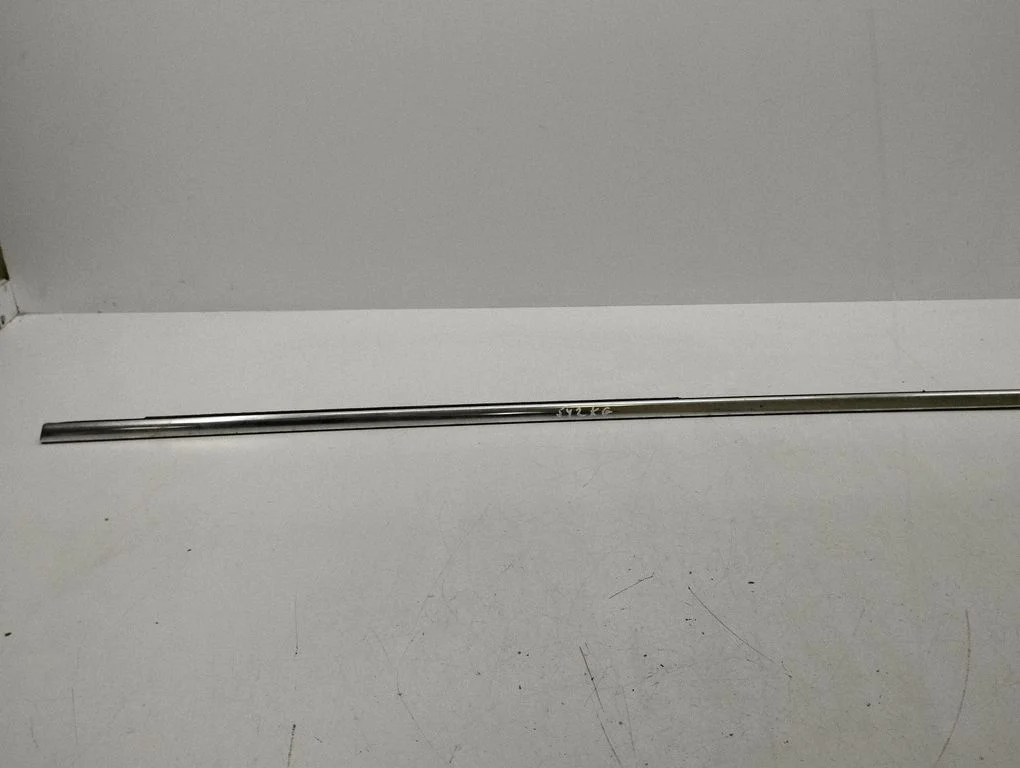 Rear door glass trim molding – left