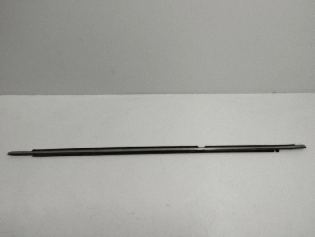 Rear door glass trim molding – left