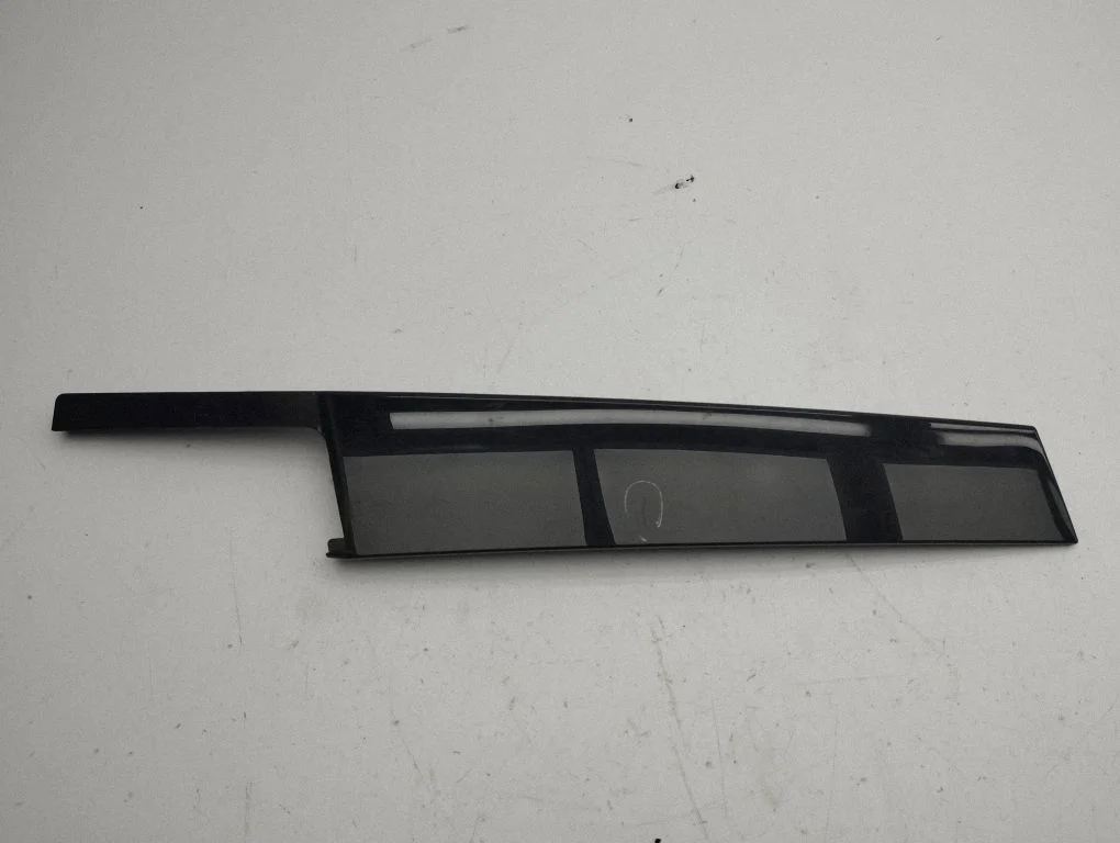 Front door glass trim molding 81a837901