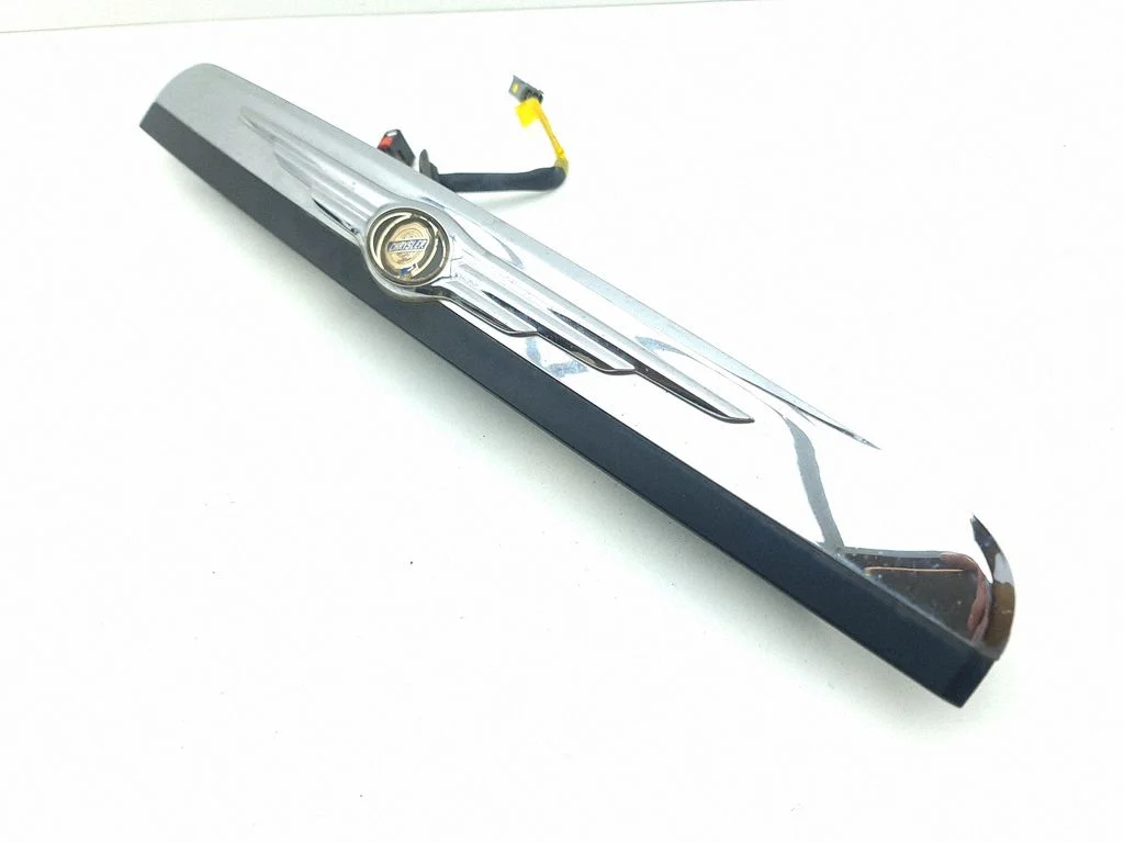 Trunk door license plate light bar 05109538AC