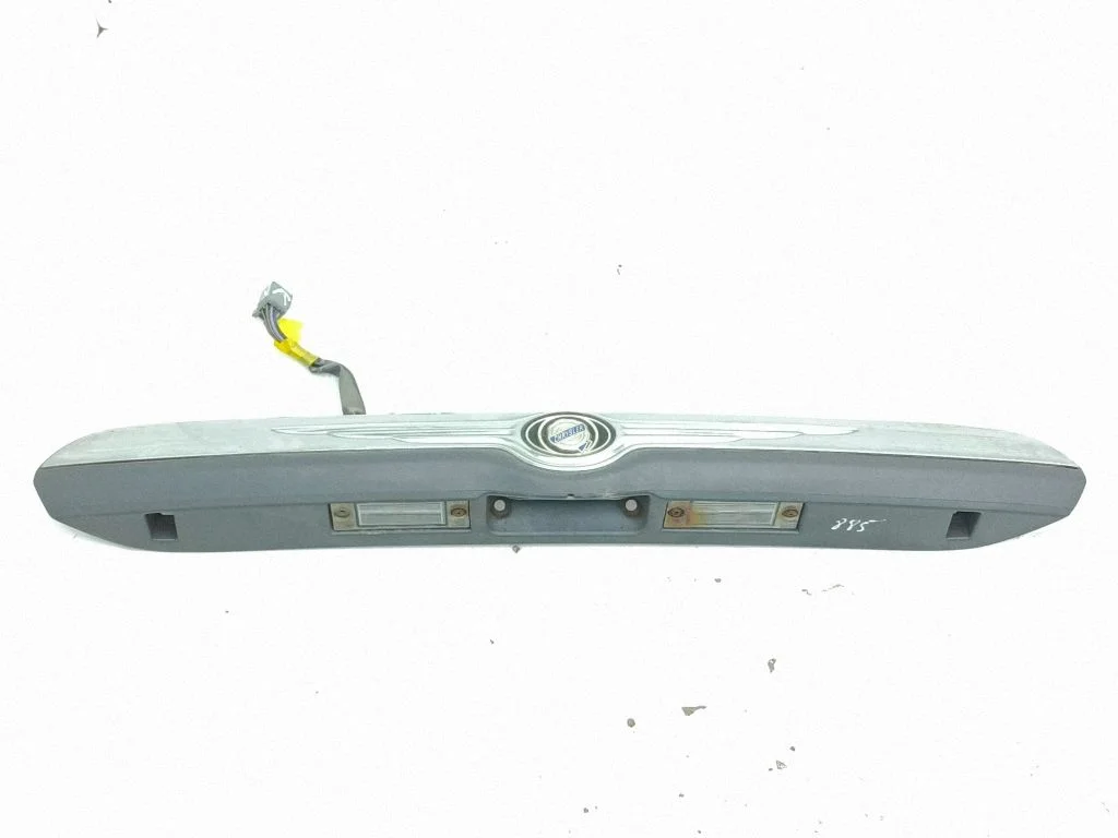 Trunk door license plate light bar