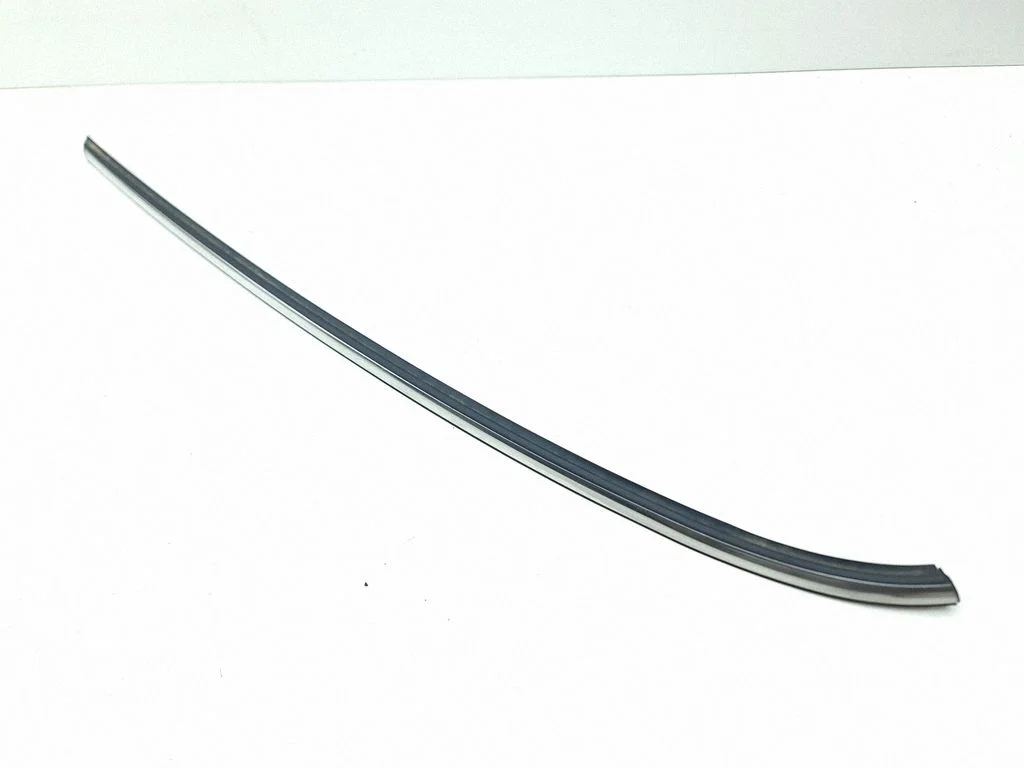 Rear side glass trim – left