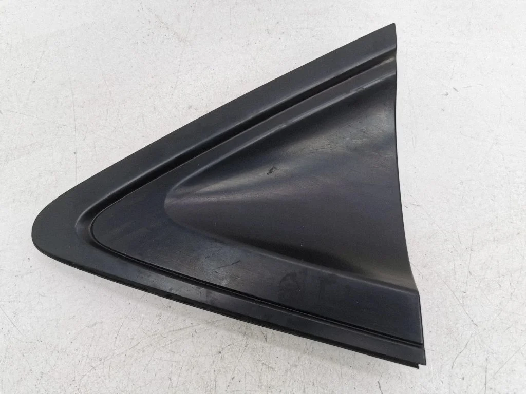 Rear side glass trim – left