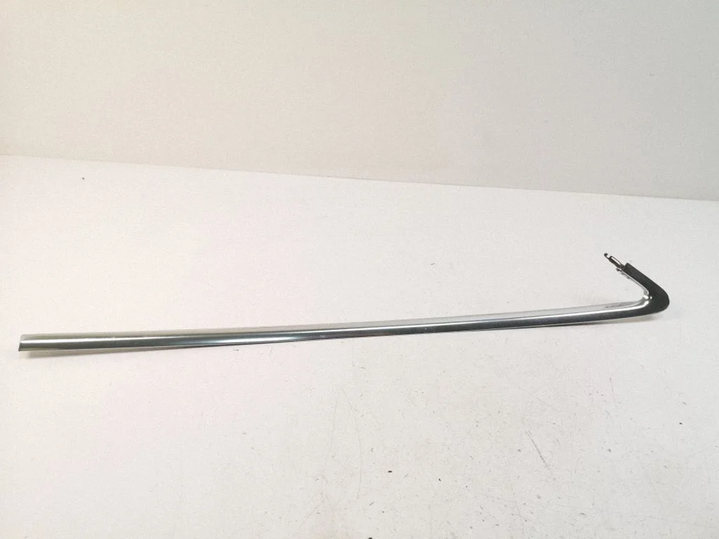 Rear side glass trim – left