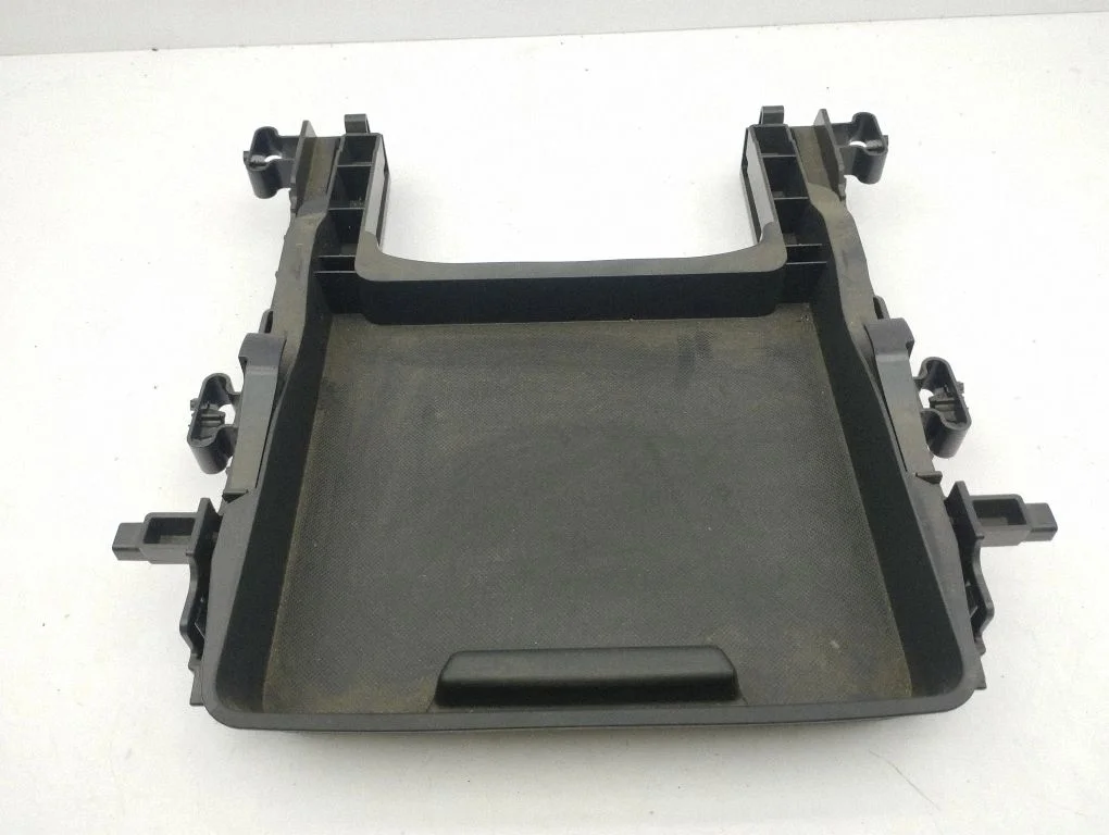 Front trunk storage compartment