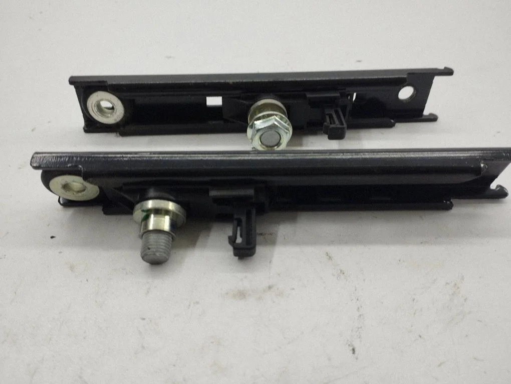 Seat belt adjustment rail