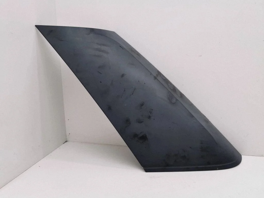 Rear glass trim – left