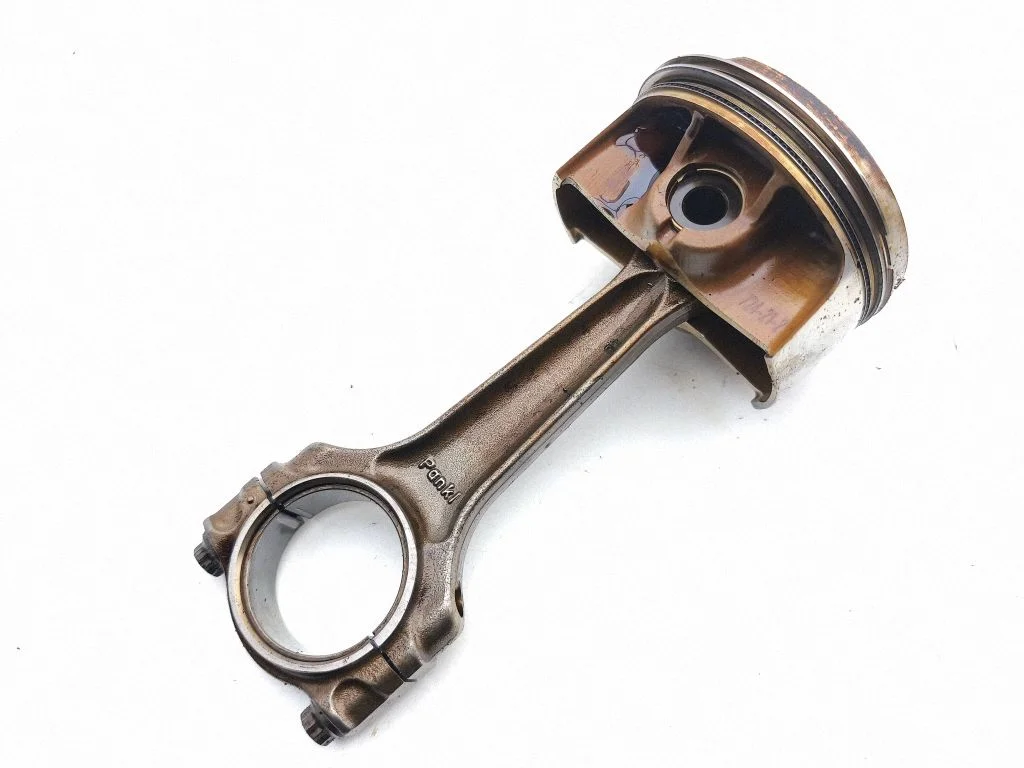 Piston with connecting rod