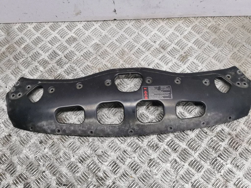 Top upper radiator support slam panel