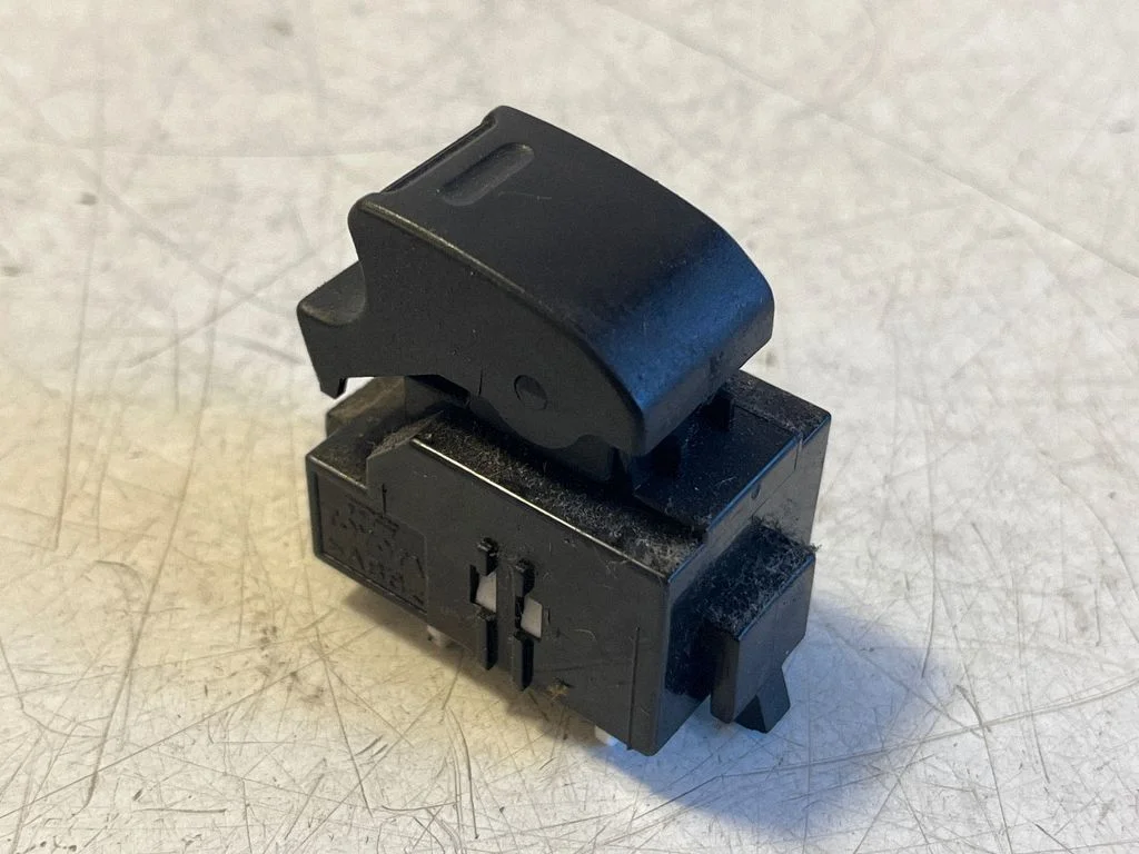 Electric window control switch – front left