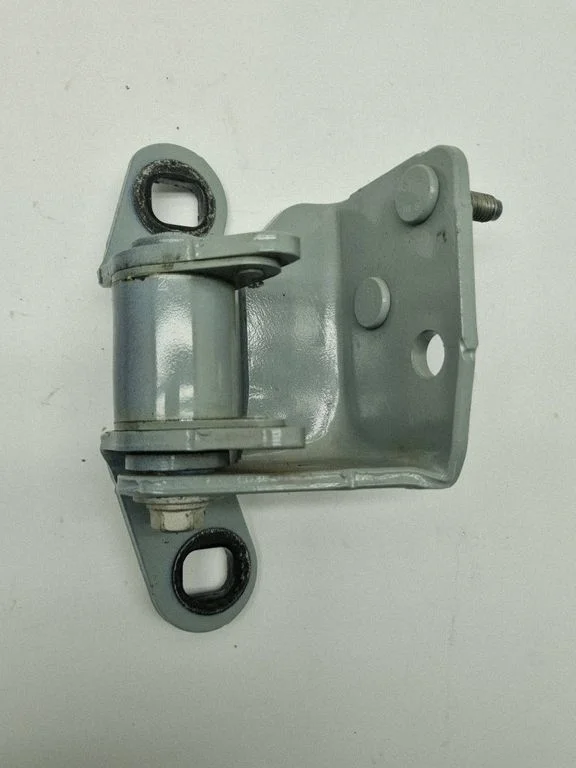 Rear door upper hinge