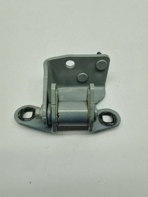 Rear door upper hinge