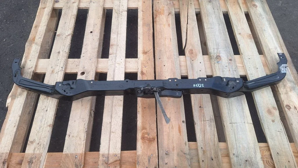 Top upper radiator support slam panel