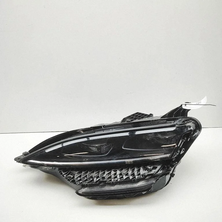 Headlight/headlamp – left