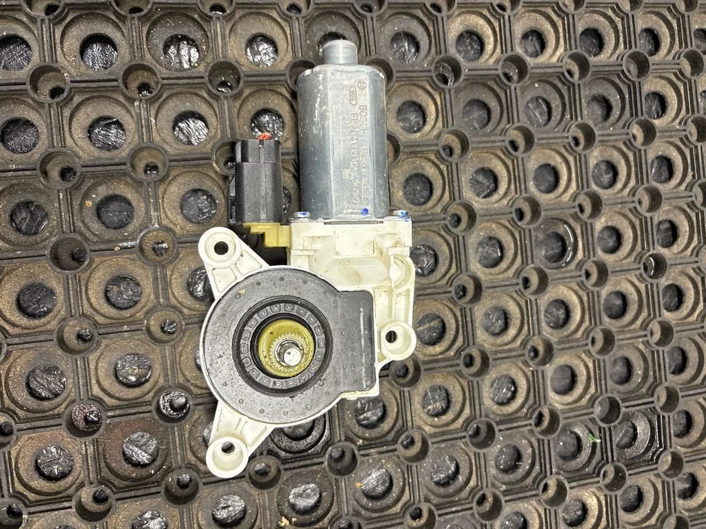Front door window regulator motor