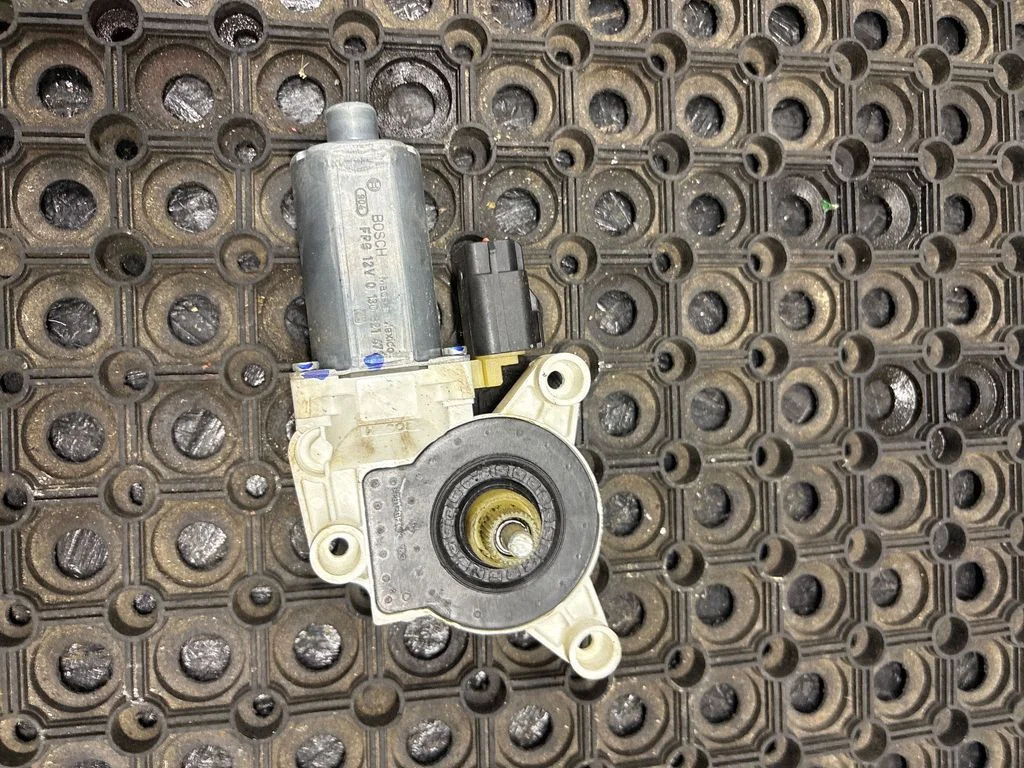Front door window regulator motor