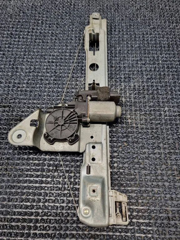 Rear door window regulator with motor 90011782