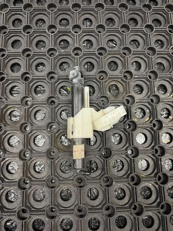Headlight washer spray nozzle 7S7113L015BA