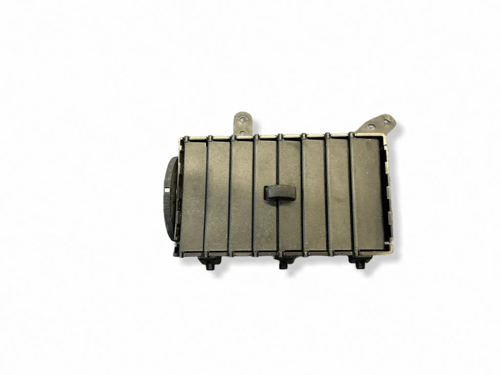 Dash center air vent grill 05028821AA