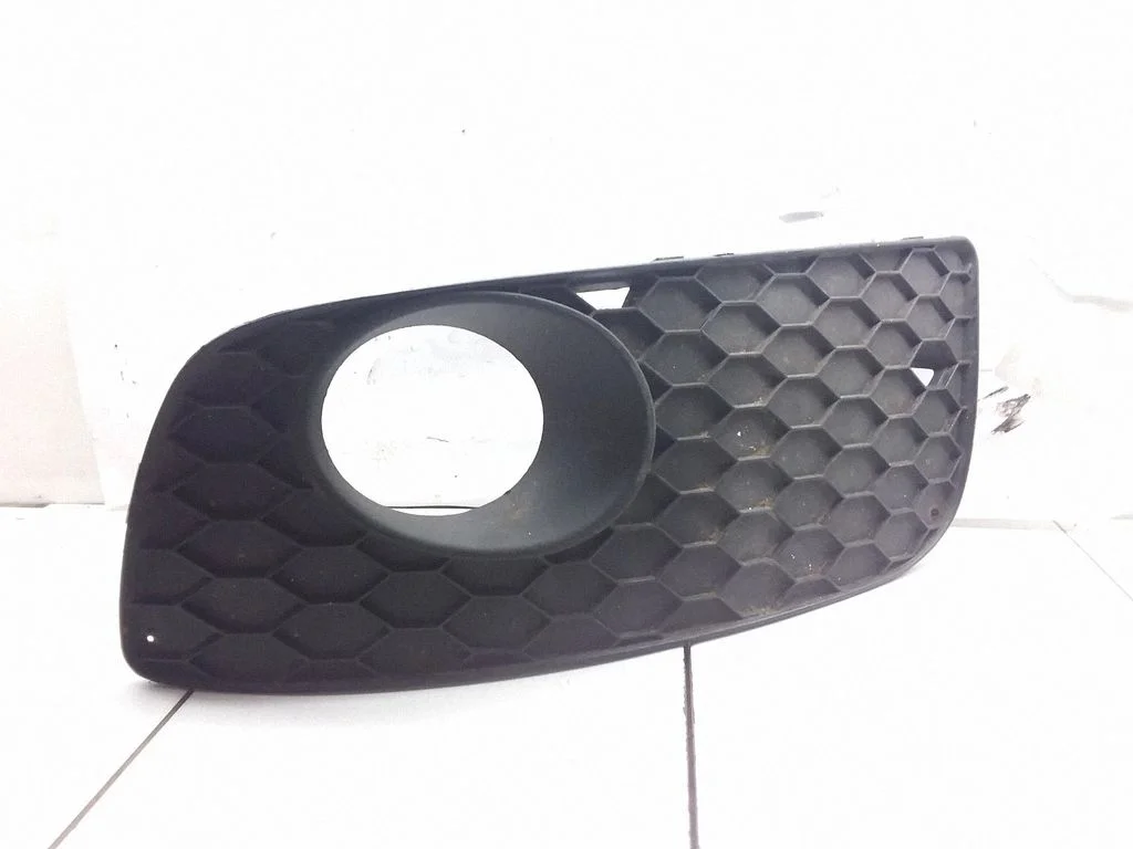 Front fog light trim/grill 1K0853665S