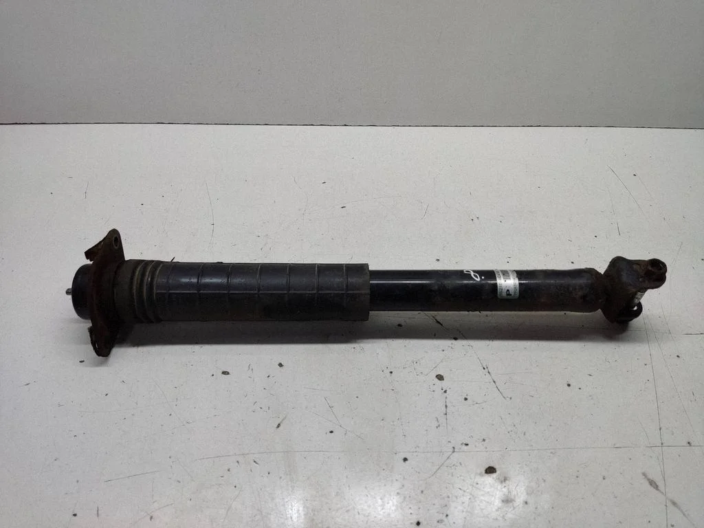 Rear shock absorber/damper 562101EA1E
