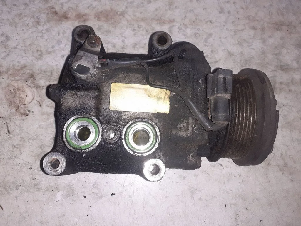 Air conditioning (A/C) compressor (pump) YS4H19D629AB