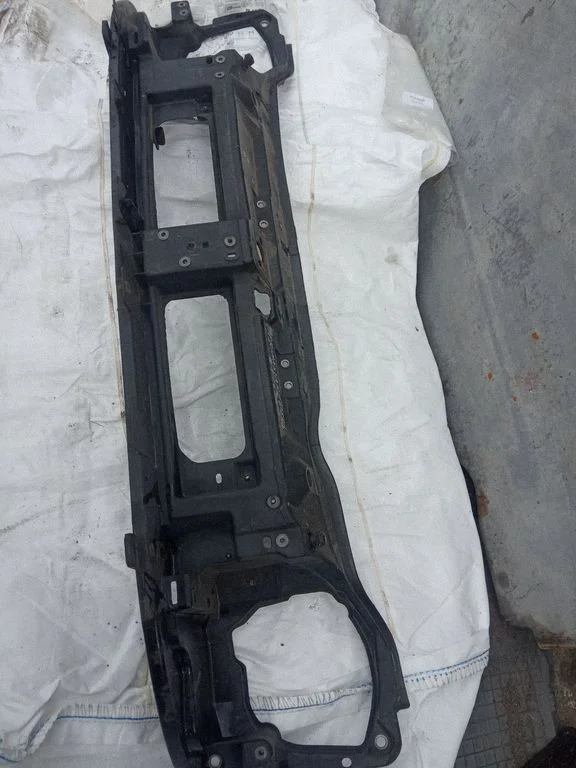 Radiator support slam panel