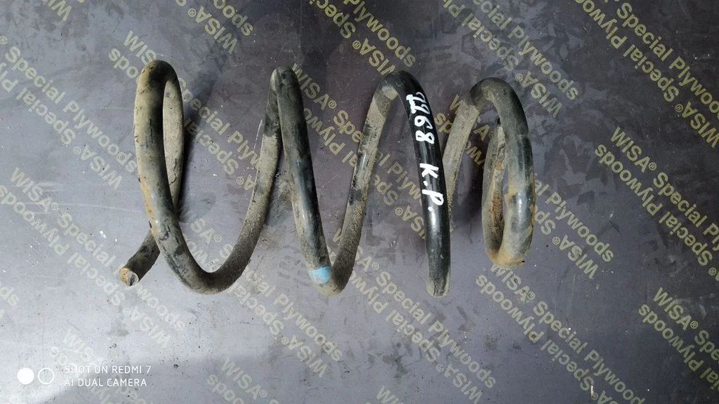 Front coil spring – left