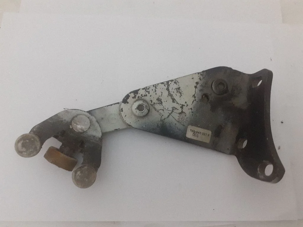 Sliding door lower roller guide/hinge 7H0843397F