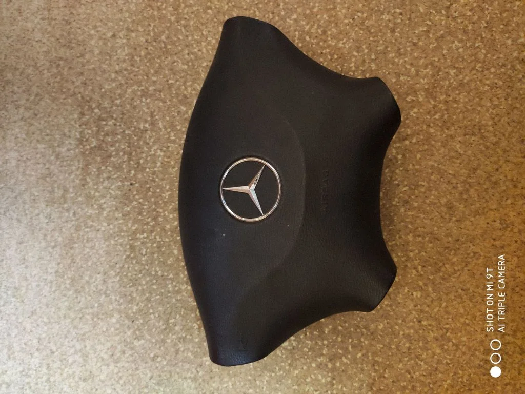 Steering wheel airbag