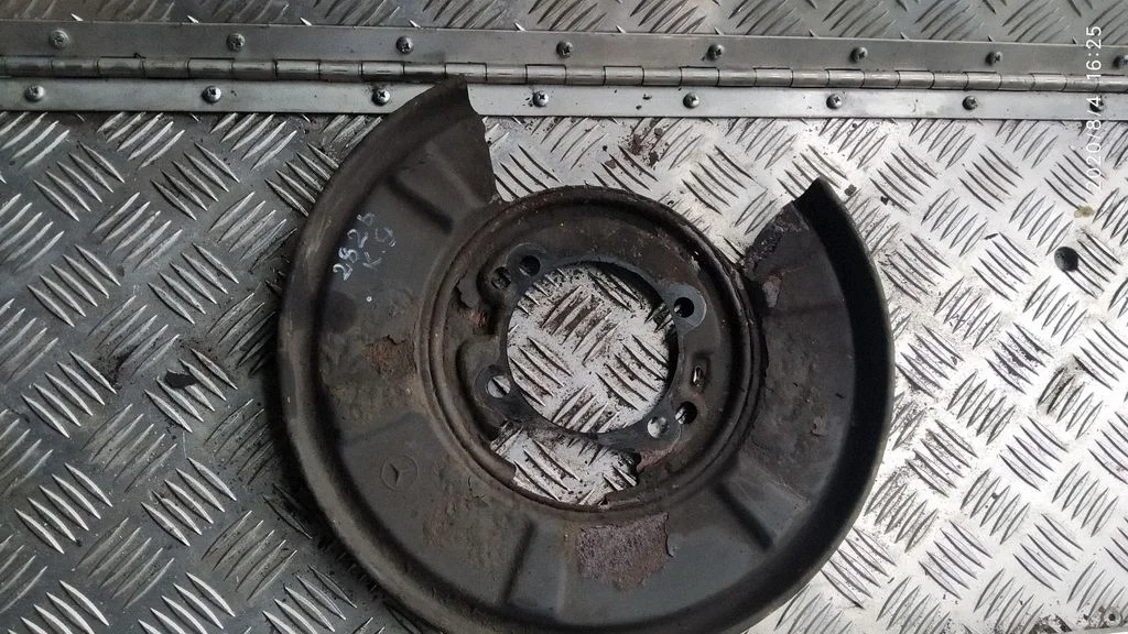 Rear brake disc plate dust cover – left