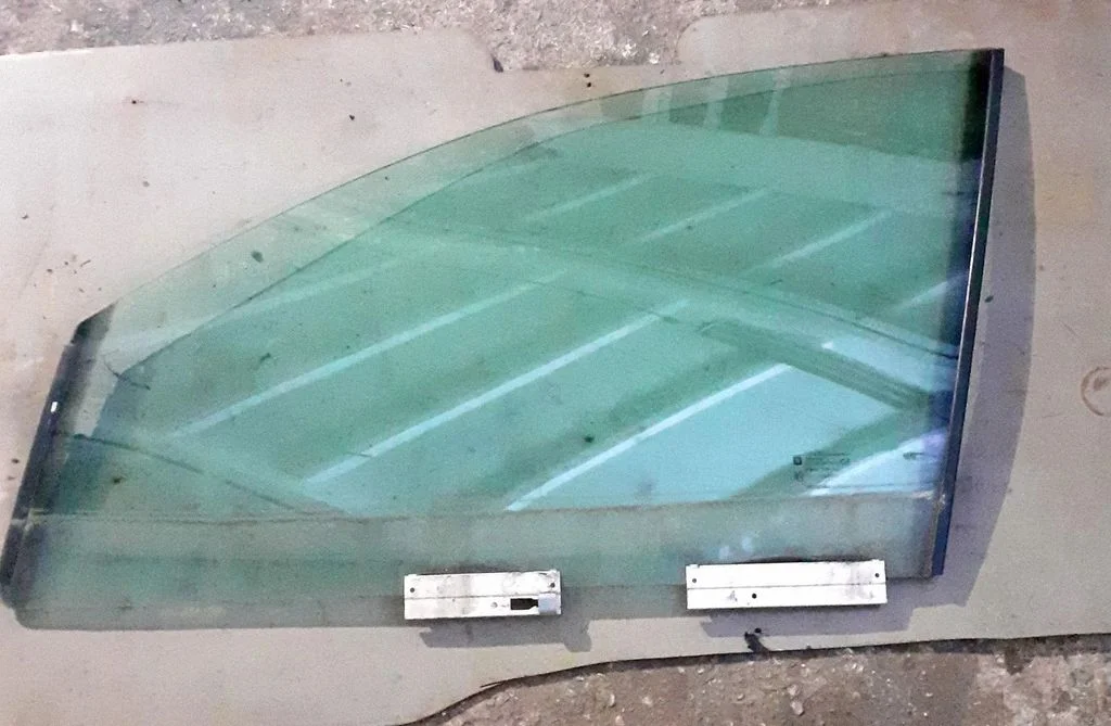 Front door window glass four-door – front left
