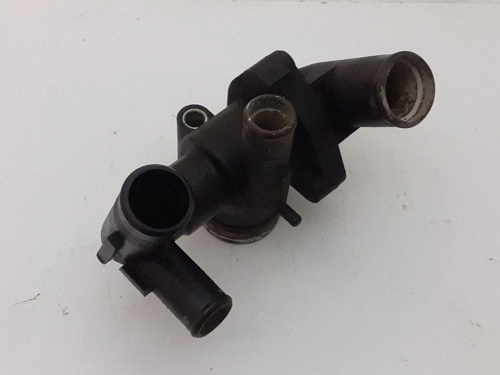 Thermostat housing 6C1Q8A586AC