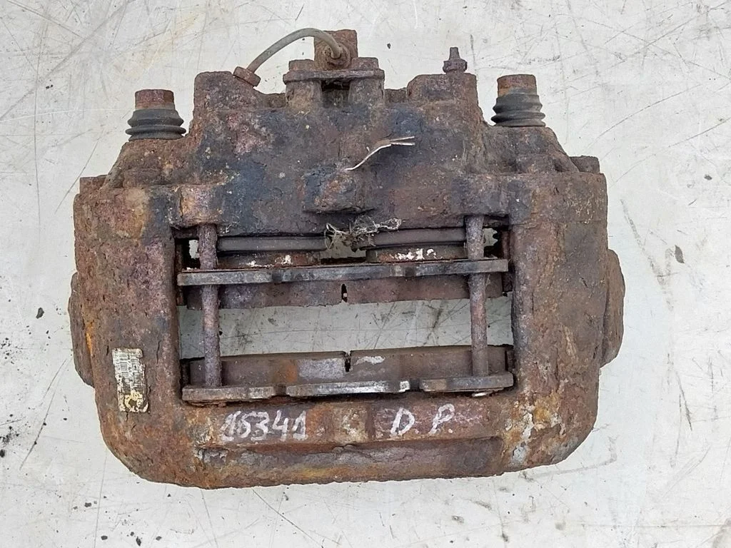 Front brake caliper 504121786