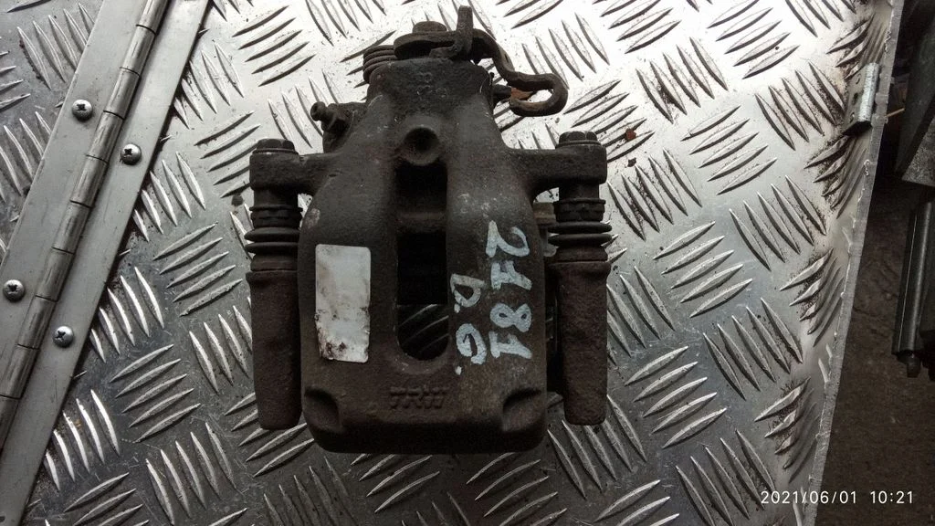 Rear brake caliper – right
