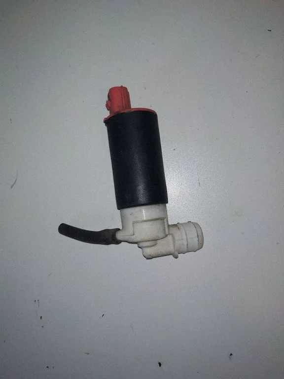Headlight washer pump