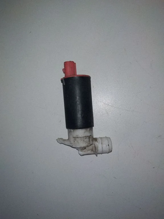Headlight washer pump