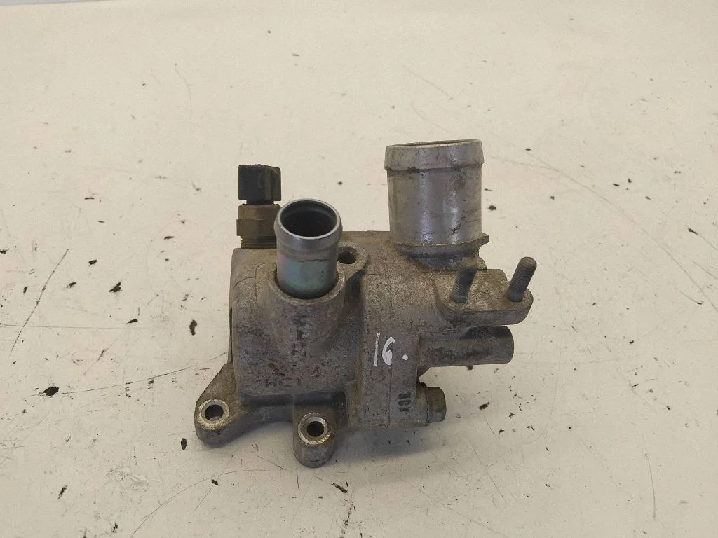 Thermostat/thermostat housing