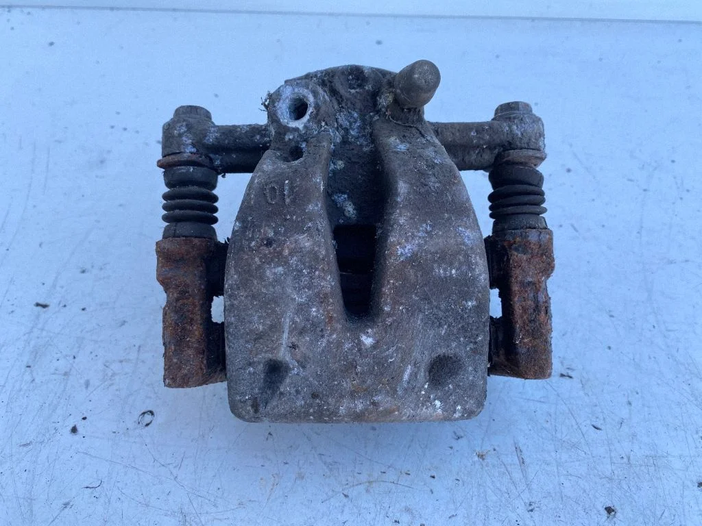 Rear brake caliper – left