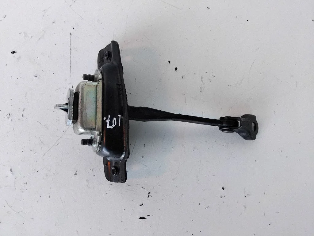 Rear door check strap stopper – right