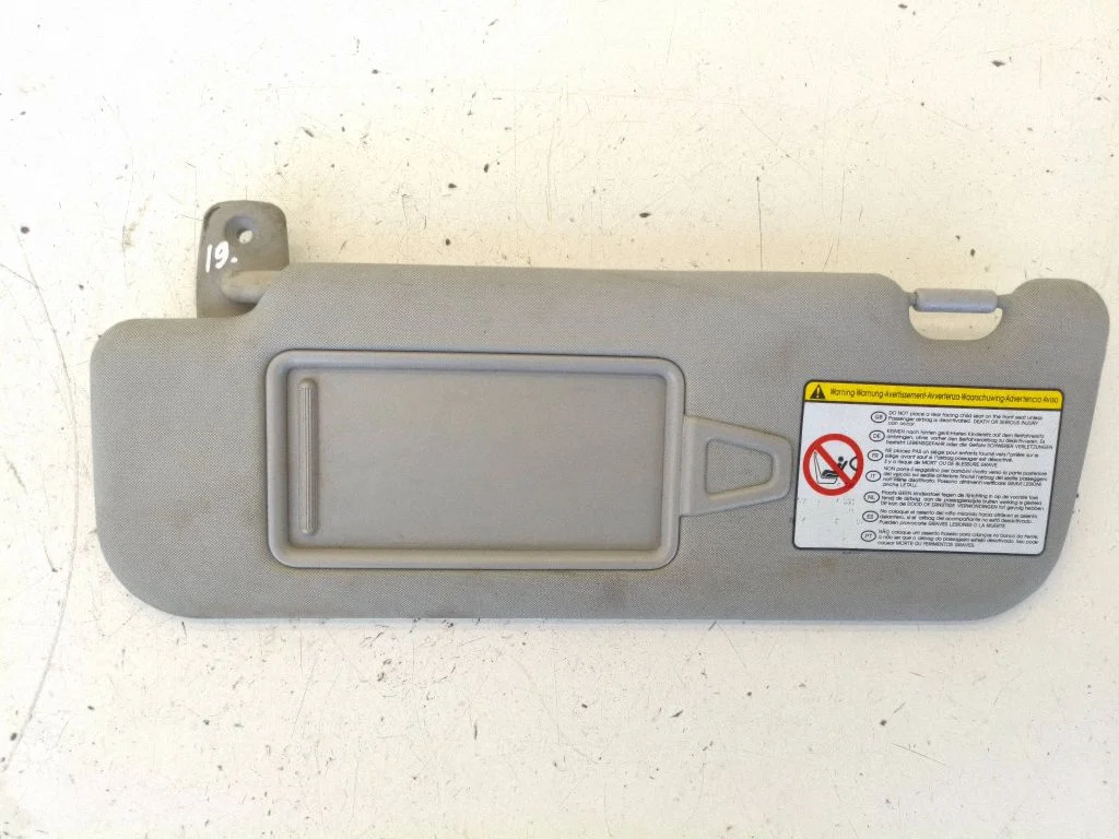 Sun visor – left