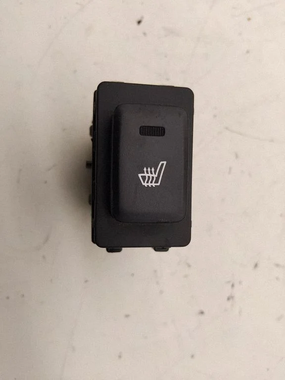 Seat heating switch