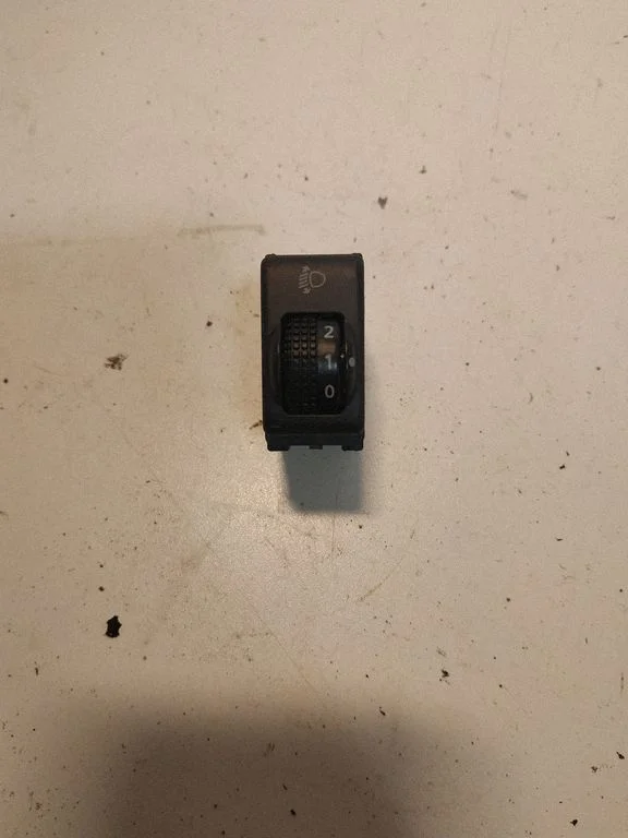 Headlight level height control switch