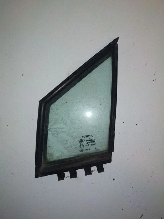 Front door vent window glass four-door – left