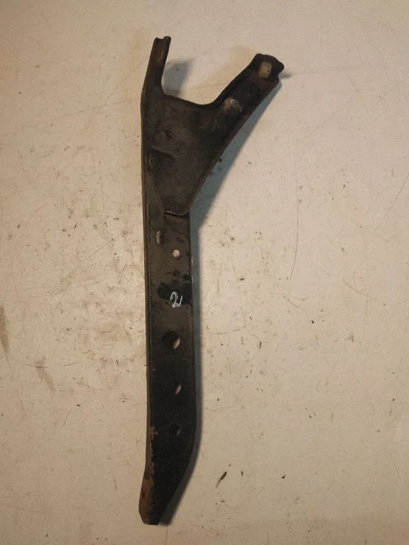 Radiator support slam panel bracket